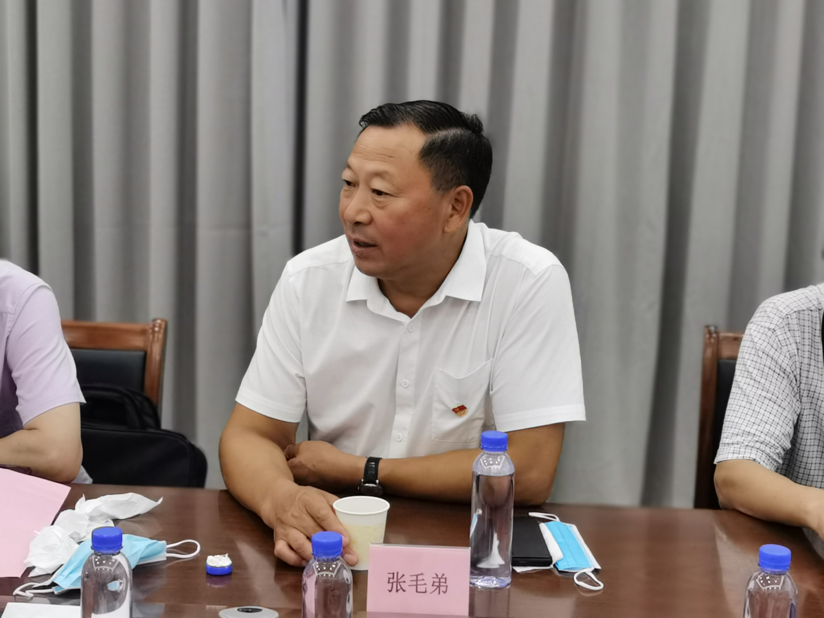 7周市镇商会党支部书记张毛弟讲话.jpg